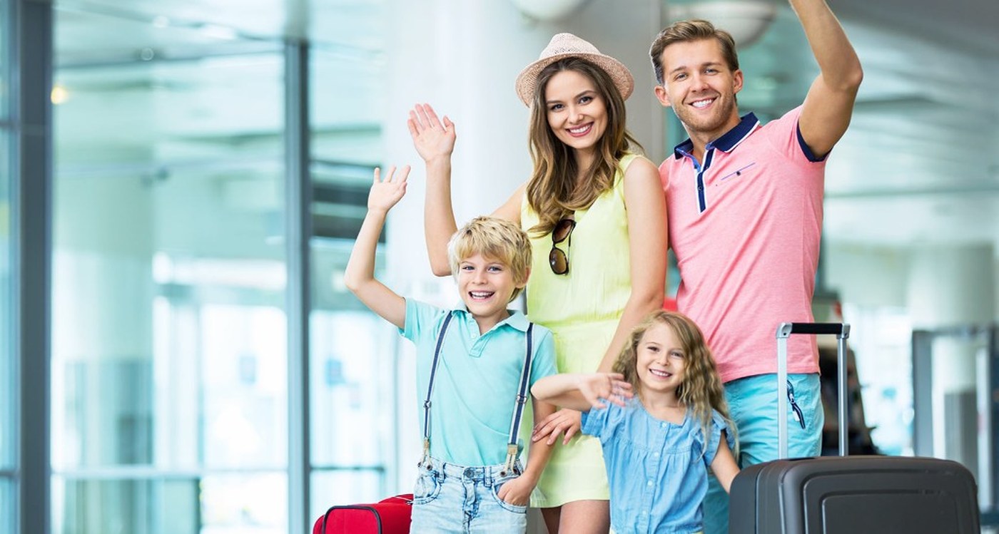Family arriving at the airport ready for their transfer